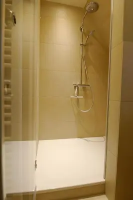 Ein Badezimmer in der Unterkunft Haus Dünenstrasse 19