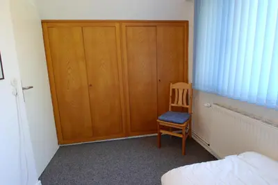 Ein Bett oder Betten in einem Zimmer der Unterkunft Straminke 14a Haus am Strande