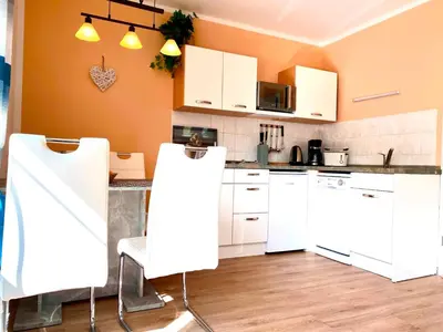 Küche/Küchenzeile in der Unterkunft Hägerende 66 Haus Windrose Wohnung Nordwind