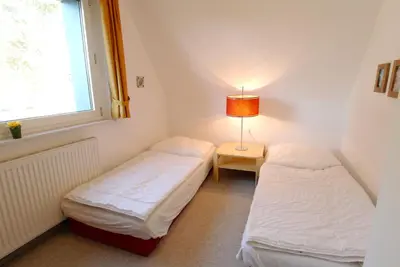 Ein Bett oder Betten in einem Zimmer der Unterkunft Straminke 14 Haus Strandidylle