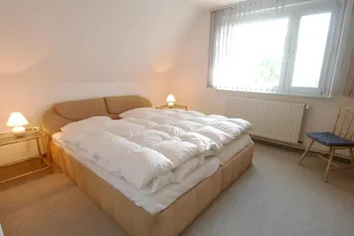 Ein Bett oder Betten in einem Zimmer der Unterkunft Straminke 14 Haus Strandidylle