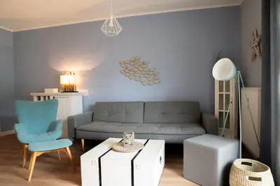 Ein Sitzbereich in der Unterkunft Neue Reihe 17 Wohnung Auszeit
