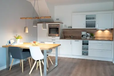 Küche/Küchenzeile in der Unterkunft Neue Reihe 17 Wohnung Auszeit