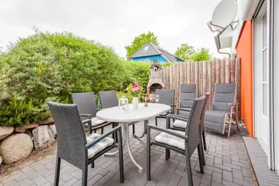 Ein Balkon oder eine Terrasse in der Unterkunft Dünengarten Am Bahndamm 77e Haus Seerose