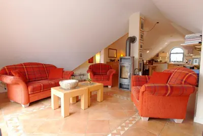 Ein Sitzbereich in der Unterkunft Birkmaase 9 Wohnung Villa Meereslust