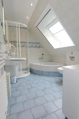Ein Badezimmer in der Unterkunft Birkmaase 9 Wohnung Villa Meereslust