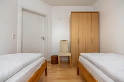 Ein Bett oder Betten in einem Zimmer der Unterkunft Glebbe 17 Wohnung 1