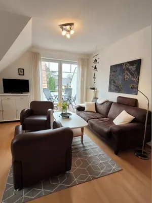 Ein Sitzbereich in der Unterkunft Hoppenberg 7 Wohnung DG links