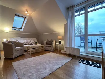 Ein Bett oder Betten in einem Zimmer der Unterkunft Hafenstraße 33 Villa Beatrice Wohnung 20