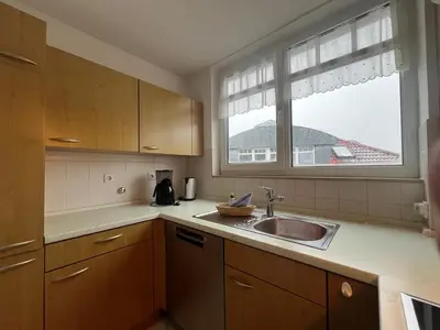 Küche/Küchenzeile in der Unterkunft Hafenstraße 33 Villa Beatrice Wohnung 20