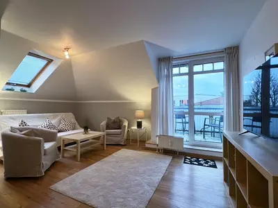 Ein Sitzbereich in der Unterkunft Hafenstraße 33 Villa Beatrice Wohnung 20