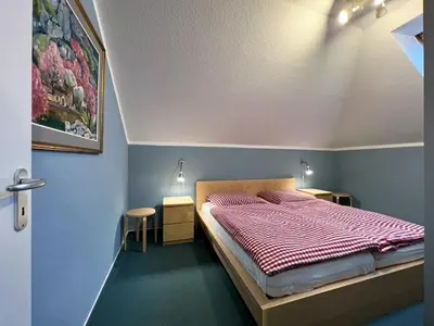 Ein Bett oder Betten in einem Zimmer der Unterkunft Hafenstraße 33 Villa Beatrice Wohnung 20