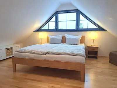 Ein Bett oder Betten in einem Zimmer der Unterkunft Birkmaase 10 Wohnung Ostseestern