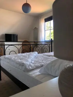 Ein Bett oder Betten in einem Zimmer der Unterkunft Heideweg 10a Haus Thea Luise