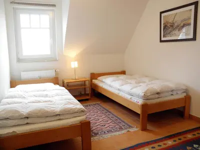 Ein Bett oder Betten in einem Zimmer der Unterkunft Glebbe 17 Wohnung 4