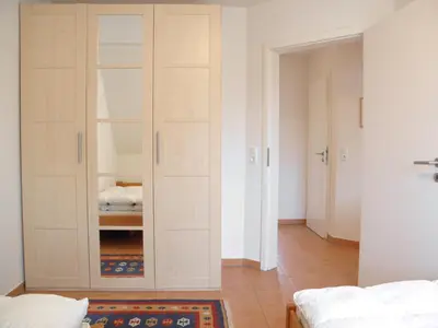 Ein Bett oder Betten in einem Zimmer der Unterkunft Glebbe 17 Wohnung 4