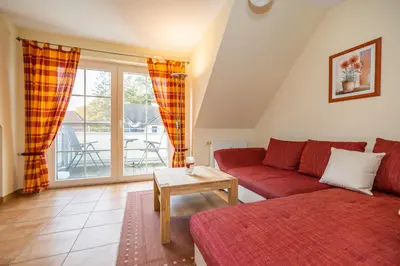 Ein Sitzbereich in der Unterkunft Neue Reihe 17 Wohnung Leuchtturm