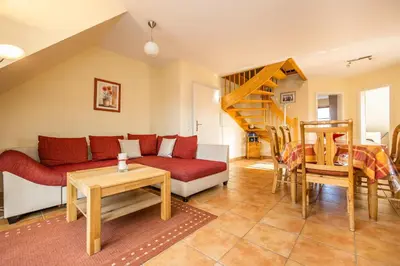 Ein Sitzbereich in der Unterkunft Neue Reihe 17 Wohnung Leuchtturm