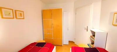 Ein Bett oder Betten in einem Zimmer der Unterkunft Neue Reihe 17 Wohnung Abendsonne