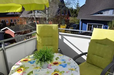 Ein Balkon oder eine Terrasse in der Unterkunft Neue Reihe 17 Wohnung Abendsonne