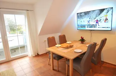 TV/Unterhaltungsangebot in der Unterkunft Neue Reihe 17 Wohnung Abendsonne