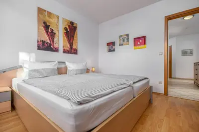 Ein Bett oder Betten in einem Zimmer der Unterkunft Hafenstrasse 28 Wohnung 2 Stadtgeflüster
