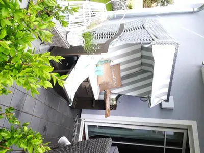 Ein Balkon oder eine Terrasse in der Unterkunft Barther Straße 18 Wohnung Hamptons