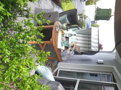Ein Sitzbereich in der Unterkunft Barther Straße 18 Wohnung Hamptons
