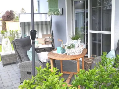Ein Sitzbereich in der Unterkunft Barther Straße 18 Wohnung Hamptons