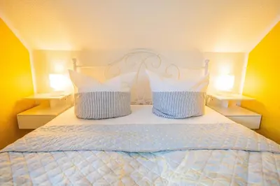 Ein Bett oder Betten in einem Zimmer der Unterkunft Wiesenstraße 23 Haus Hansi