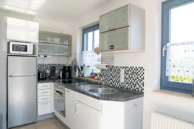 Küche/Küchenzeile in der Unterkunft Wiesenstraße 23 Haus Hansi