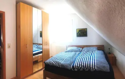Ein Bett oder Betten in einem Zimmer der Unterkunft Hoppenberg 9 Wohnung 3