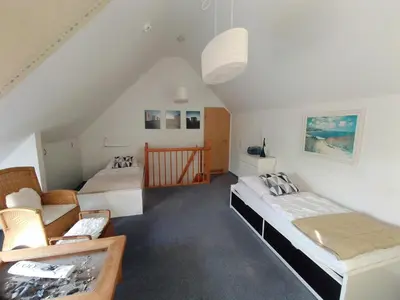 Ein Bett oder Betten in einem Zimmer der Unterkunft Lindenstraße 43 Wohnung 6 Mein Seepferdchen