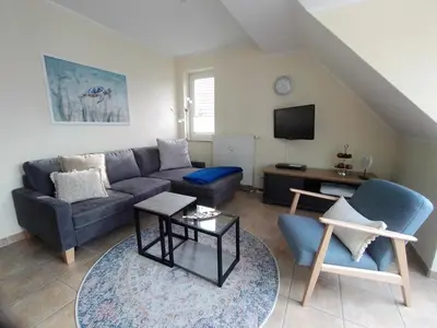 Ein Sitzbereich in der Unterkunft Lindenstraße 43 Wohnung 6 Mein Seepferdchen