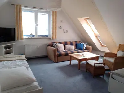 Ein Sitzbereich in der Unterkunft Lindenstraße 43 Wohnung 6 Mein Seepferdchen