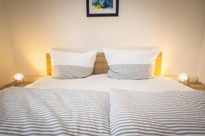 Ein Bett oder Betten in einem Zimmer der Unterkunft Störtebekerstrasse 10b Wohnung 2