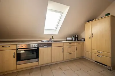 Küche/Küchenzeile in der Unterkunft Strandstrasse 54c d Wohnung 9