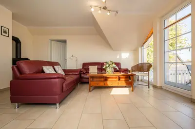 Ein Sitzbereich in der Unterkunft Strandstrasse 54c d Wohnung 9