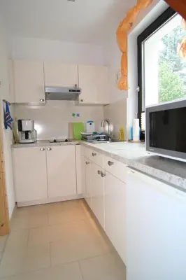 Küche/Küchenzeile in der Unterkunft Kirchweg 14 Hus Pila
