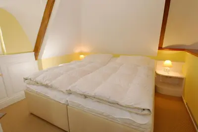 Ein Bett oder Betten in einem Zimmer der Unterkunft Müggenburger Weg 35 Wohnung oben rechts