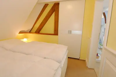 Ein Bett oder Betten in einem Zimmer der Unterkunft Müggenburger Weg 35 Wohnung oben rechts