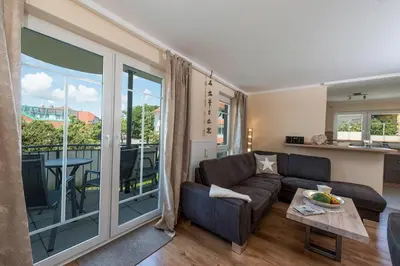 Ein Sitzbereich in der Unterkunft Hafenstrasse 22 Wohnung 2 Muschelsucher
