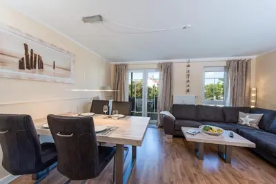 Ein Sitzbereich in der Unterkunft Hafenstrasse 22 Wohnung 2 Muschelsucher