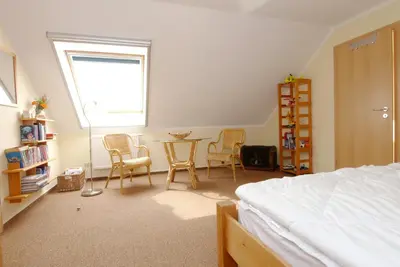 Ein Bett oder Betten in einem Zimmer der Unterkunft Waldstrasse 15 Haus Seepferdchen