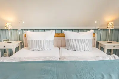 Ein Bett oder Betten in einem Zimmer der Unterkunft Martha-Muller-Grählert-Weg 6 Wohnung 8