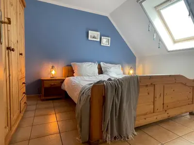 Ein Bett oder Betten in einem Zimmer der Unterkunft Zur Wellenwiese 10a
