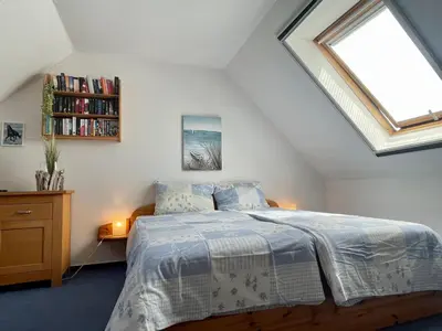 Ein Bett oder Betten in einem Zimmer der Unterkunft Zur Wellenwiese 10a