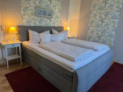 Ein Bett oder Betten in einem Zimmer der Unterkunft Haus Sonnenschein in Zingst