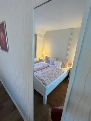 Ein Bett oder Betten in einem Zimmer der Unterkunft Haus Sonnenschein in Zingst