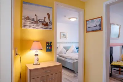 Ein Bett oder Betten in einem Zimmer der Unterkunft Birkenstrasse 6i Wohnung 13